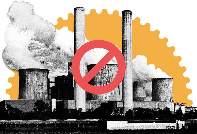 Smoke rising towards the sky from the chimneys of a factory, and a stop illustration sign