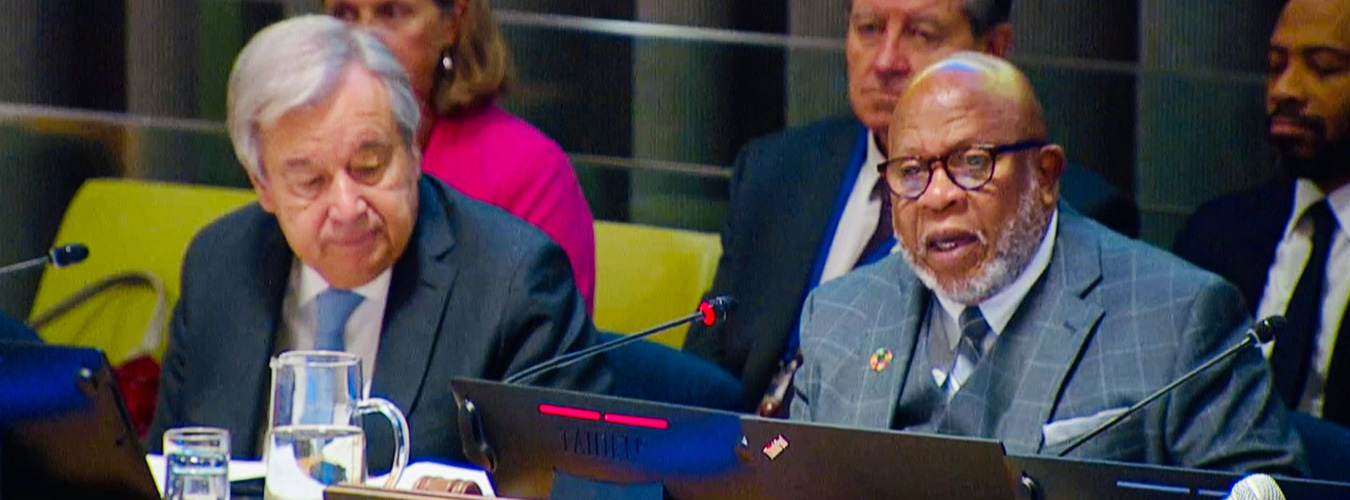 Panel of participants in a meeting with UN SG amongst them.