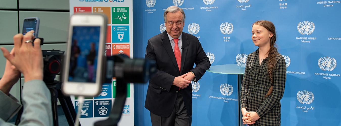 Secretary-General António Guterres (left) meeting with climate activist Greta Thunberg in Vienna.